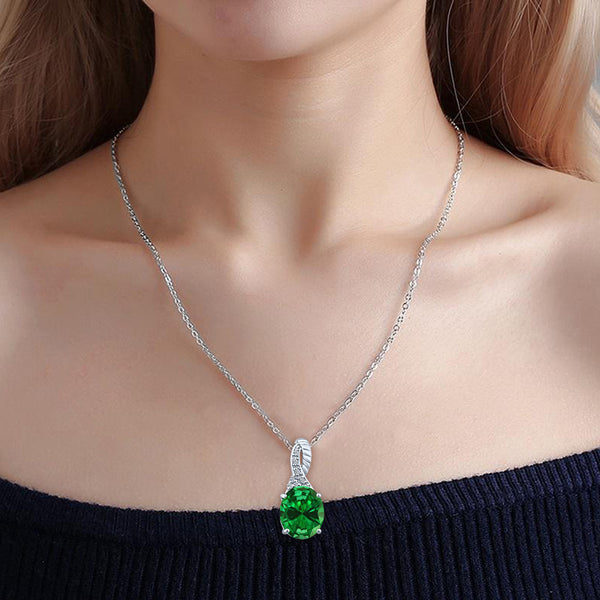 5.00 Carat Oval Cut Lab Created Emerald Gemstone & Diamonds Pendant in 14K White Gold.
