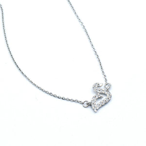 Minimalist diamond mute swans pendant in 18k white gold 18 inch adjustable to16