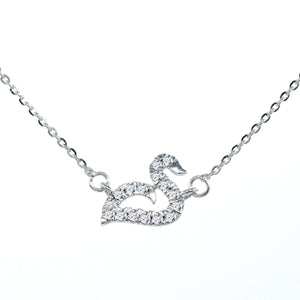 Minimalist diamond mute swans pendant in 18k white gold 18 inch adjustable to16